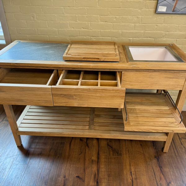 Wooden table with accessories spaces